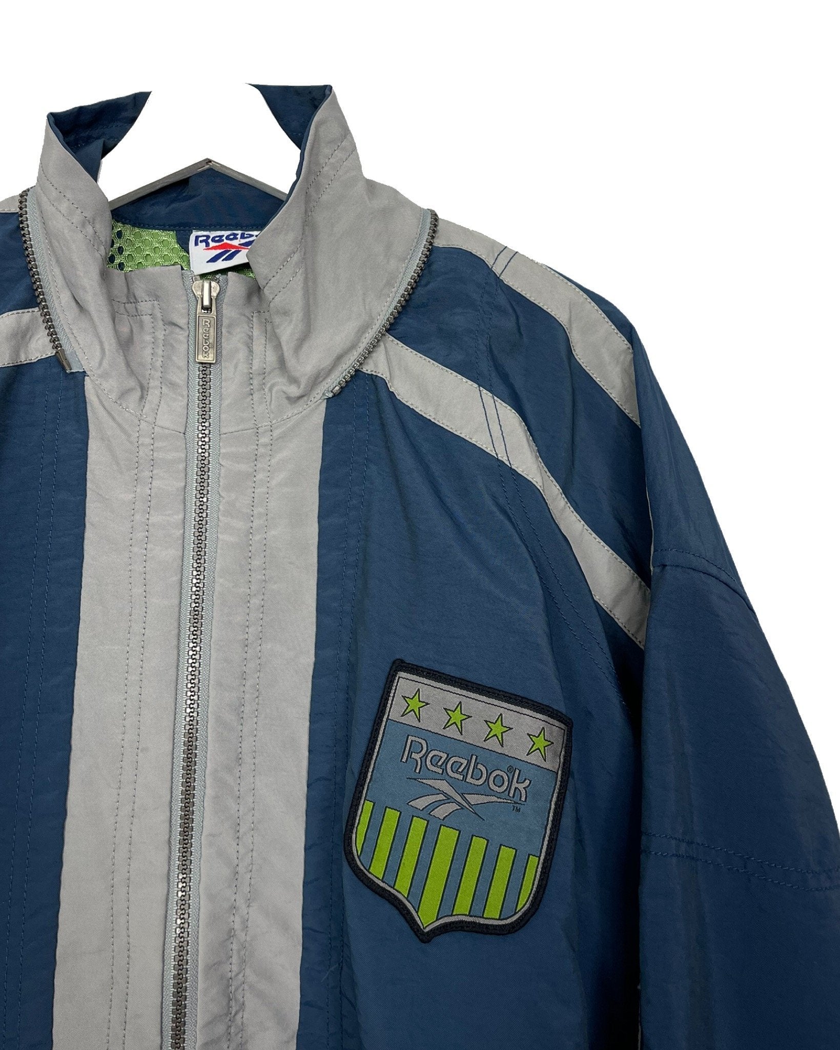 Blouson léger Reebok Blouson léger - L - PLOMOSTORE